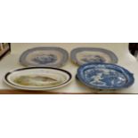 An early 19th Century pearlware warming meat platter, blue transfer printed, together with two other