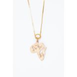 A 9ct gold pendant shaped as South Africa with pieced depiction of giraffe and game hunters,