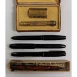A collection of mid 20th Century fountain pens and a gold plated travel razor, boxed