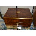 A Victorian walnut dressing case, fitted interior with vessels with plated mounts