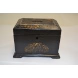 A Victorian black papier mache money box, circa 1860, initials T.A in mother of pearl