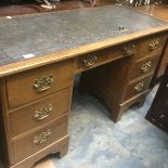 Twin pedestal writing desk.