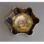 A Vienna hexagonal shaped dish, painted with a classical scene of a lady and gent sitting by a