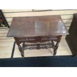 An 18th Century hall table with a single drawer, on turned supports