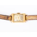 An 18ct gold Tegra watch circa 1930's rectangular dial on narrow leather strap A/F foxing