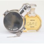A Cavale perfume silver plated holder containing a full bottle of Cavale by Faberge perfume
