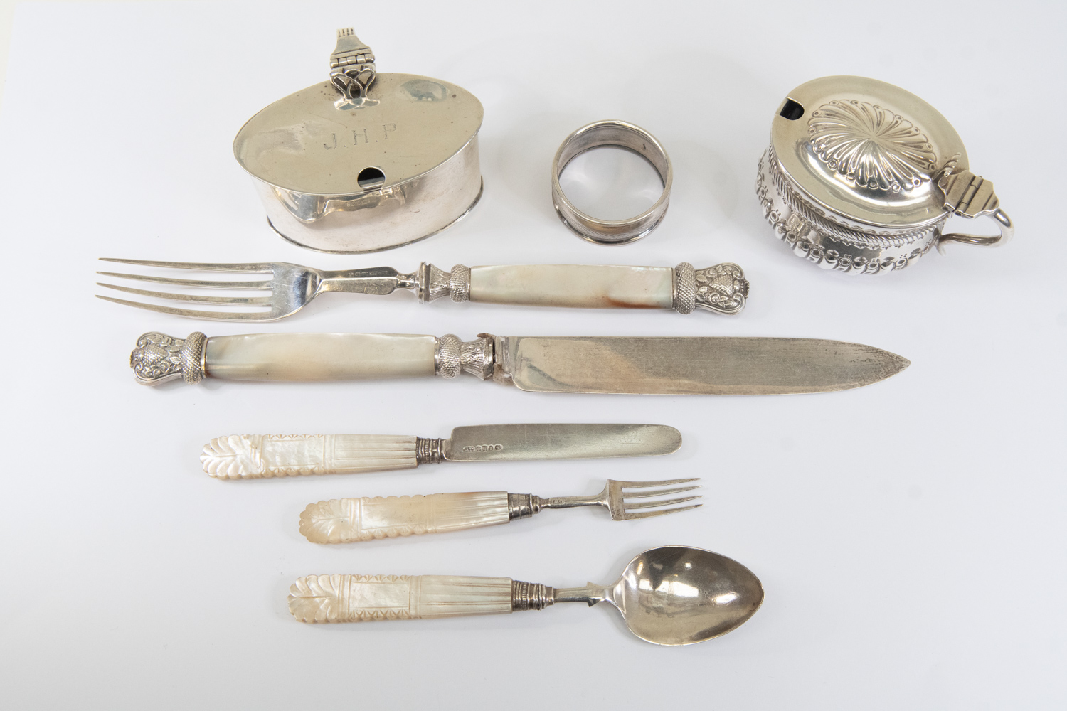 A collection of silver including: a William IV silver three piece cutlery suite, comprising knife, - Image 2 of 2