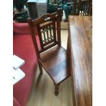 An Early 20th Century Oak Dining Table and Set of Four chairs