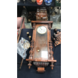 A late 19th Century walnut Vienna wall clock, ball finial (pendulum)