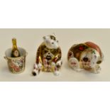 Two Royal Crown Derby bear paperweights and champagne bucket and bottle (second quality and silver