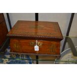 A Regency rosewood work casket or sarcophagus form, circa 1820, brass inlaid, fitted interior, bun