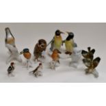 German porcelain birds, to include a Penguin, Owl, Woodpecker, Kingfisher etc (9)