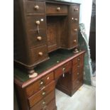 Early 20th Century pedestal desk with campaign handles along with another smaller desk