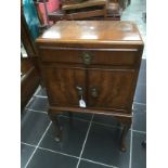 Early 20th century Walnut veneered side cupboard. Raised on cabriole legs.