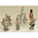 German, Saxony, Sitzendorff porcelain figures, groups to include a Guard Sergeant circa 1833 (6)