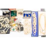 A collection of costume jewellery to include silver locket and bracelet, white metal Celtic brooch,
