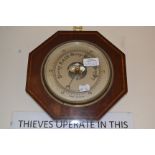 An Edwardian aneroid barometer and a bracket timepiece(2)
