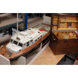 A mid 20th Century radio controlled boat, resembling a military / coastguard craft, 3½  ft long,