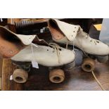 A pair of vintage roller skates, kid wooden wheels (2)