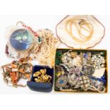 A collection of costume jewellery to include vintage faux pearl beads, rainbow glass necklace and