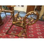 A 20th Century beech spinning wheel, of recent manufacture