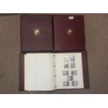 Three Great Britain stamp albums containing a large quantity of mint issues (3)
