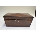 A Regency walnut tea caddy of sarcophagus from