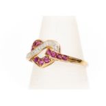 A ruby and diamond ring, Lovers Knot, in the form of a heart knot, 14ct gold, size T, total gross