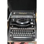 Remington typewriter in original black carry case