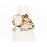 An opal and 9ct gold ring, oval white opal, rubover set, size Q1/2 along with a diamond and aqua