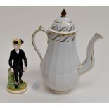 An English Porcelain coffee pot and cover of fluted form.  Decorated with a band of green fronds and