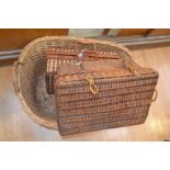 A large wicker basket and wicker picnic case, plus smaller wicker basket containing a further picnic