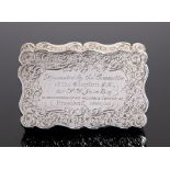 An Edwardian silver snuff box of football interest, inscribed to the top 'Presented by the Committee