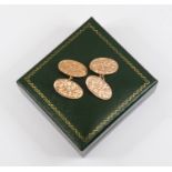 A pair of 9ct gold foliate engraved oval cufflinks, total gross weight approx. 7gms
