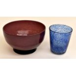 An Art Deco amethyst glass footed bowl, together with a mottled blue glass vase (2)