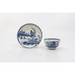 A Worcester blue and white tea bowl and saucer, 'Rock Strata Island' pattern, circa 1770, painted W,