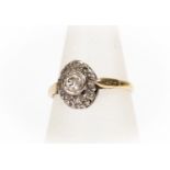 An Art Deco diamond set cluster ring, comprising central stone approx 0.20ct, with diamond set