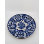 A large blue and white Dutch Delft platter. Date; late eighteenth century. Size 36cm. diameter,