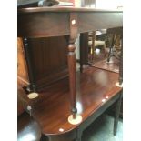 Mahogany Edwardian dining table in two sections.