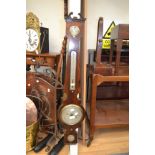 A 19th Century rosewood F. Pini aneroid barometer, incorporating a spirit level