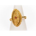 An unmarked high carat (tests as 22ct gold) ethnic design with granular decoration to the border,