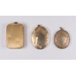A 9ct gold oval locket, total gross weight approx 13.3gms,  together with a gilt metal example and