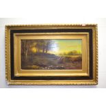 J.C Thom, British, 19th Century, figures in a landscape at sunset, signed and dated (18) 71 l.r, oil