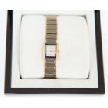 A Rado ladies jubilee tank watch with jewelled steel link strap, original box and packaging