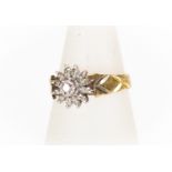 An 18ct gold ladies diamond star cluster ring, diamond cut shank,   ring size N,  total gross weight