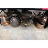 A large parcel of assorted domestic copper hollow wares, to include haystack measures, cooking pans,