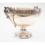 An Elkington & Co large two handled silver punch bowl on a pedestal base, the border frieze with
