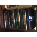 A collection of ten GB stamp albums, containing mixed First Day Covers and mint stamp issues