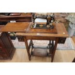 A 1930's Jone's oak sewing machine work station, good working condition