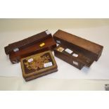 Vintage games, to include three boxes of bone dominoes, a travel chess board and a cribbage board (